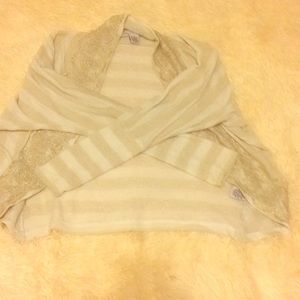 A stripped, sparkly cardigan.